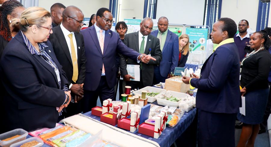 Kenya’s Cabinet Secretary for Education Hon Julius Migos Ogamba being taken through exhibition when he visited icipe's Duduville Campus on Wednesday