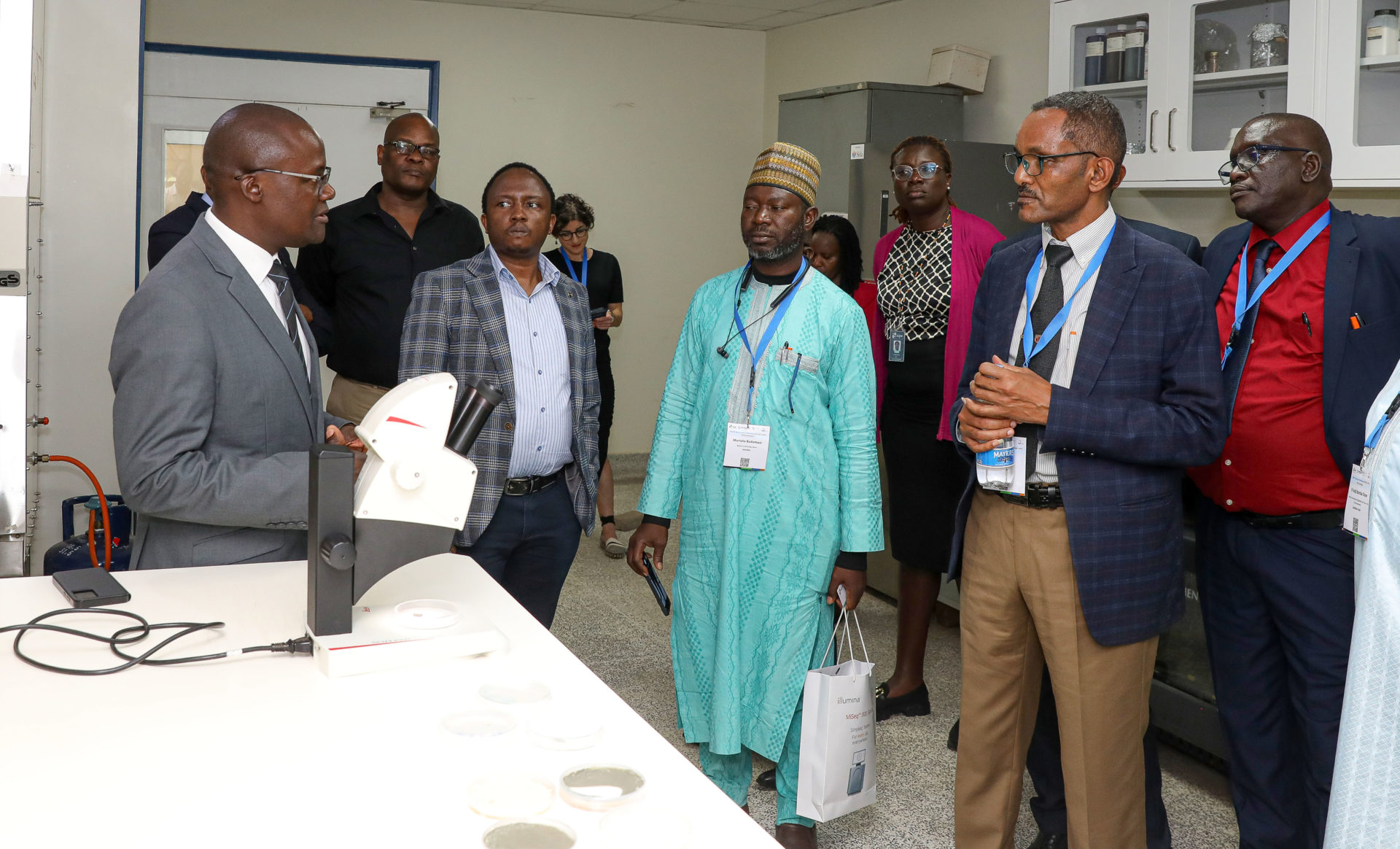 Dr Takemore Chagomoka (L), the head of Scaling and Business Acceleration unit at icipe talks to some of the members of the delegation who visited the centre. Photo/Brian Mwashi