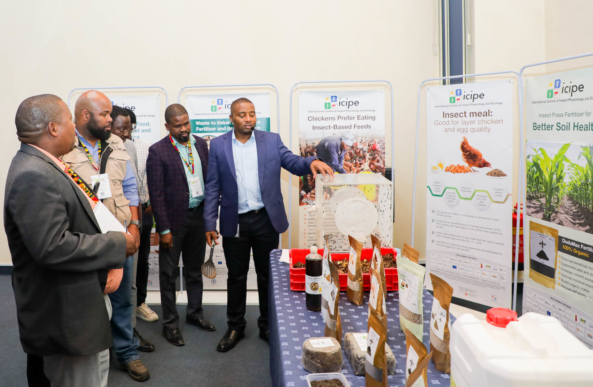 Dr Dennis Beesigamukama, Postdoctoral Fellow in Insect Frass Fertilizers and Soil Health under the Environmental Health Theme, guiding the group through the Insects for Food and Feed (INSEFF) project and displayed a mini-exhibition 