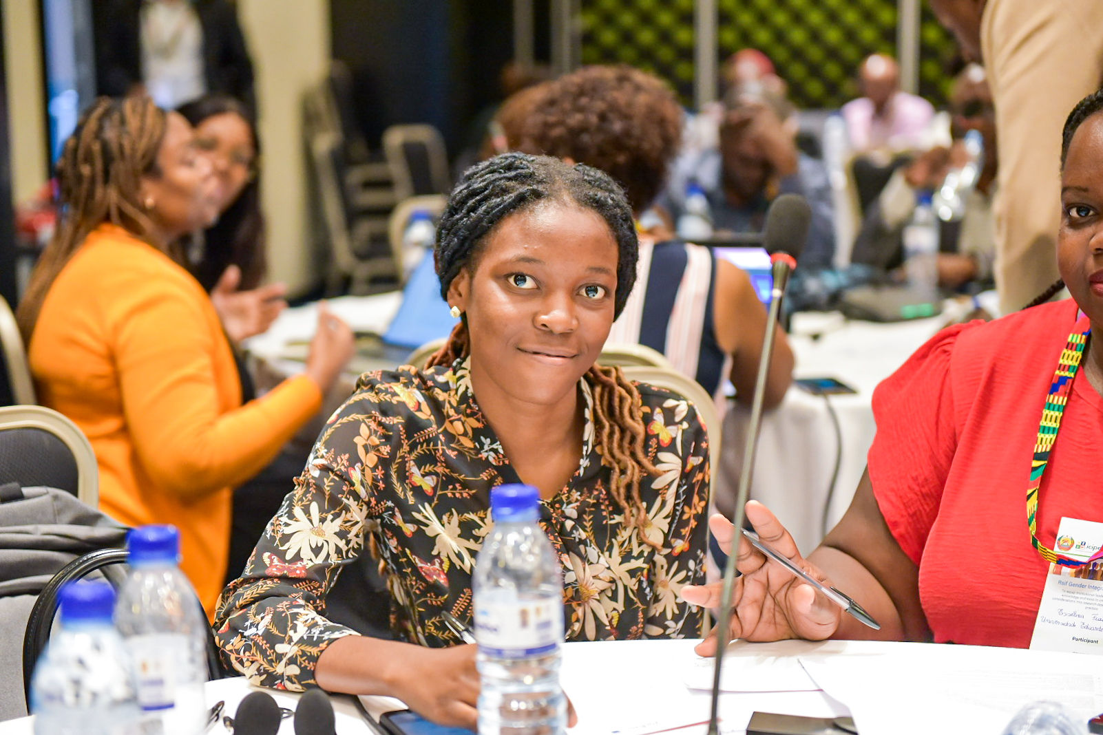 A participant follows the discussion keenly.